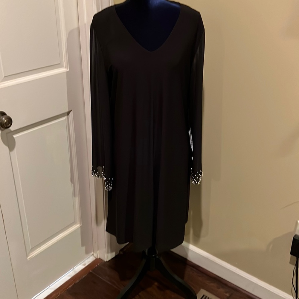 Beautiful wedding guest dress. Never worn.